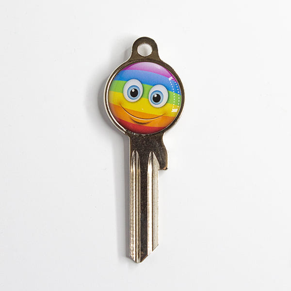 Smiley-Gesicht in Regenbogenfarben als Schlüsselrohling für Ihren Zweitschlüssel